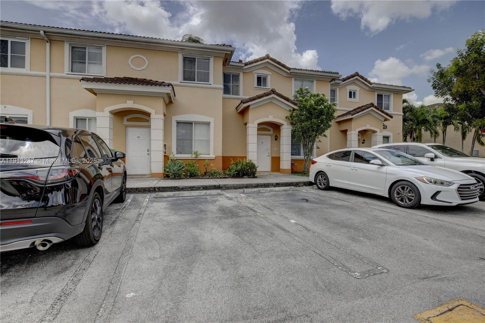 7341 Northwest 174th Terrace, Unit 107 Hialeah, FL 33015 - Photo 1 of 21