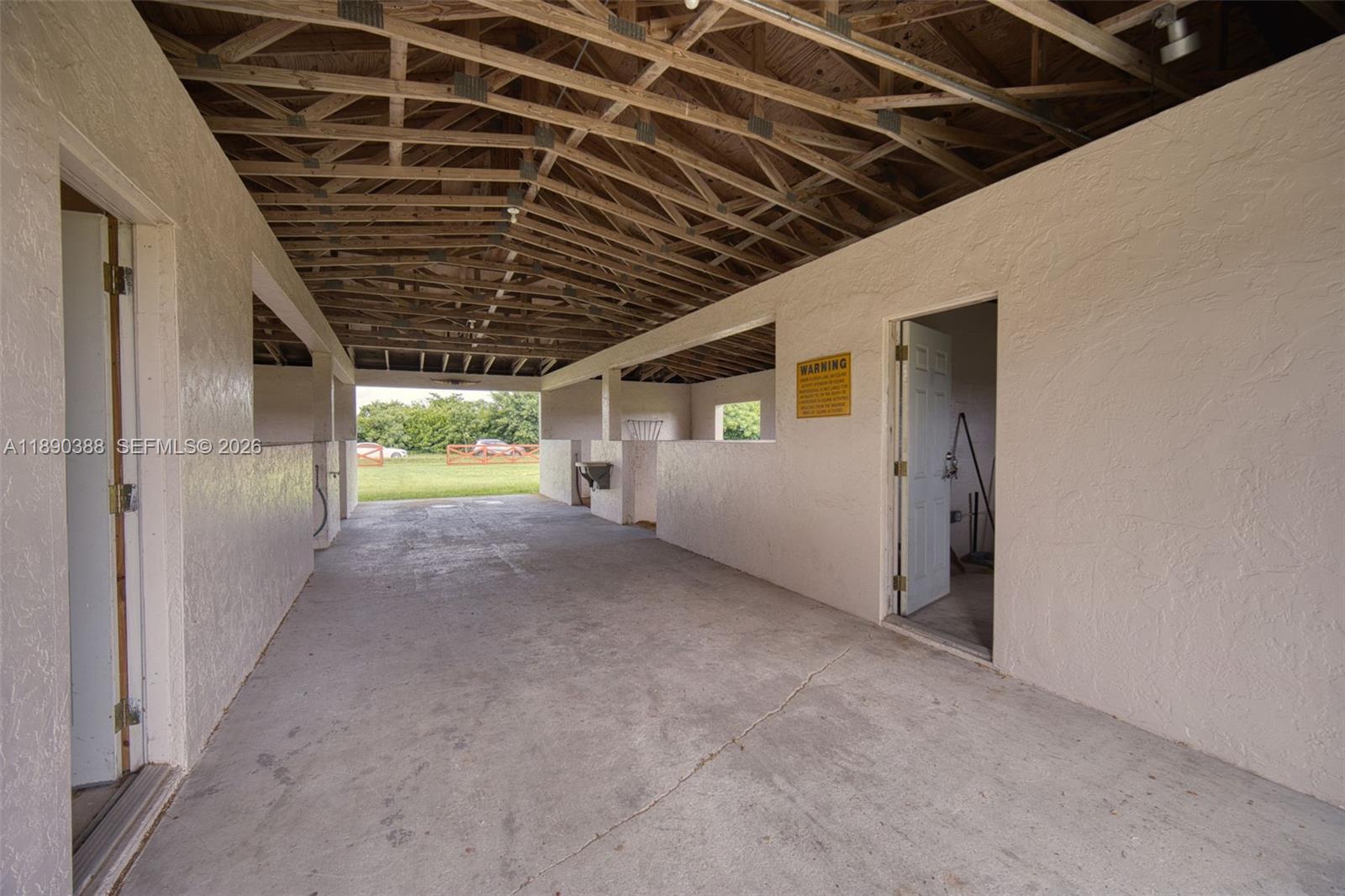 27743 Southwest 172nd Place Homestead, FL 33031 - Photo 16 of 35 a view of large empty room