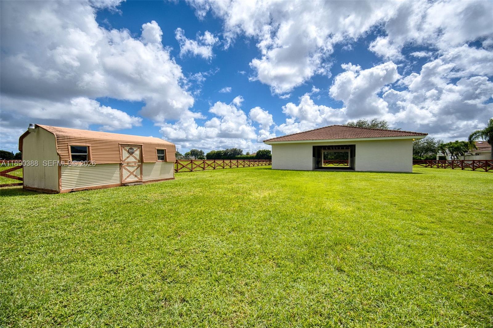 27743 Southwest 172nd Place Homestead, FL 33031 - Photo 21 of 35 a view of a house with a backyard