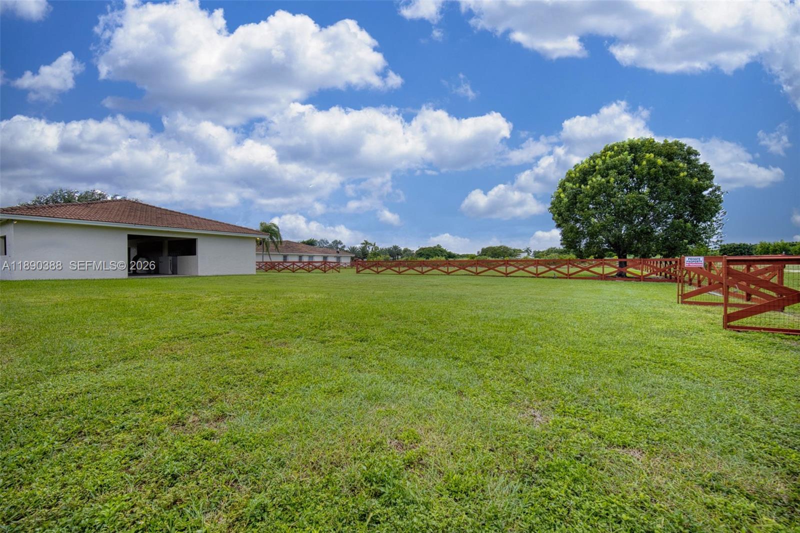 27743 Southwest 172nd Place Homestead, FL 33031 - Photo 28 of 35 a view of a house with a big yard