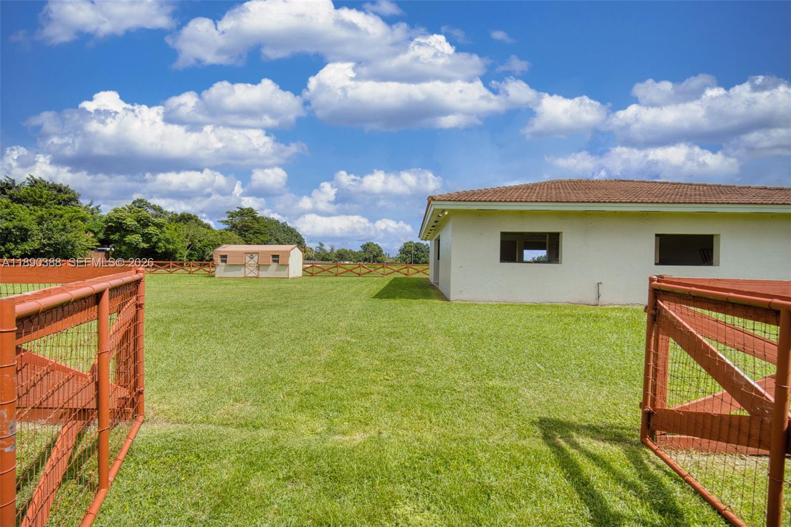 27743 Southwest 172nd Place Homestead, FL 33031 - Photo 33 of 35 a view of swimming pool from a yard