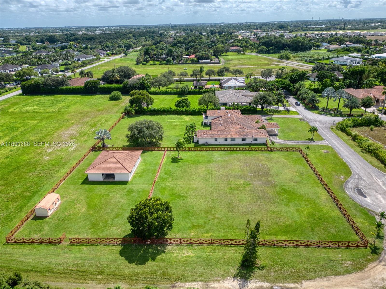 27743 Southwest 172nd Place Homestead, FL 33031 - Photo 4 of 35 an aerial view of a house with a yard
