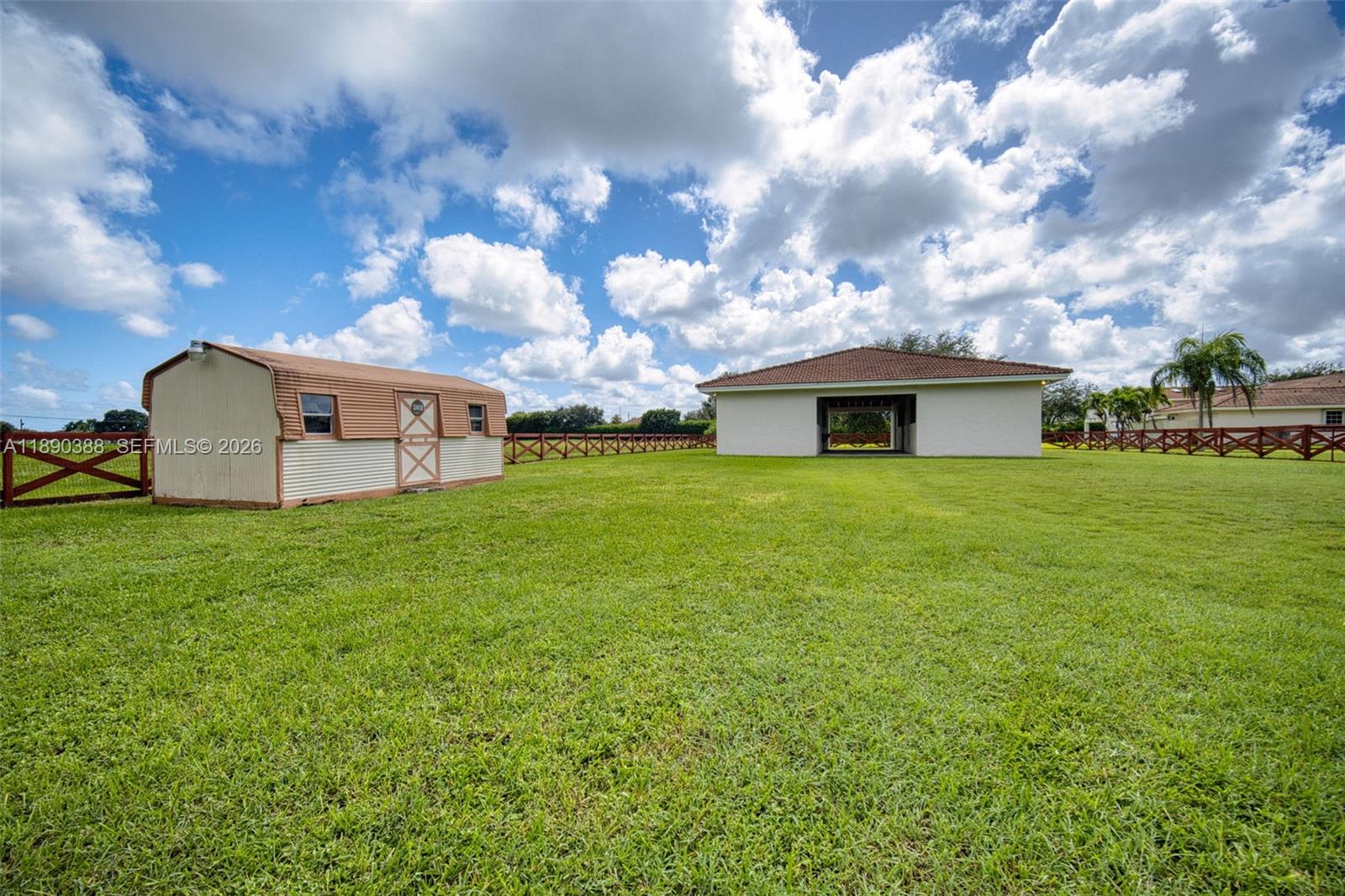 27743 Southwest 172nd Place Homestead, FL 33031 - Photo 9 of 35 a view of a house with a backyard