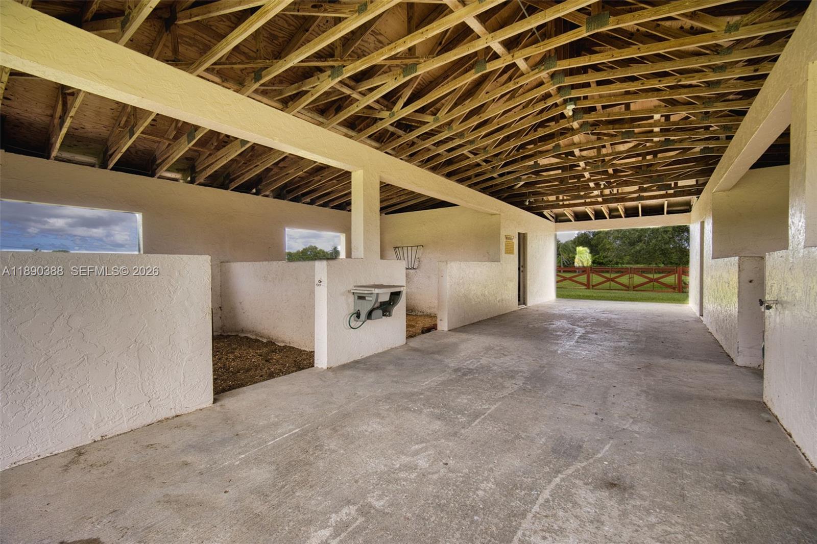 27743 Southwest 172nd Place Homestead, FL 33031 - Photo 10 of 35 a view of a garage