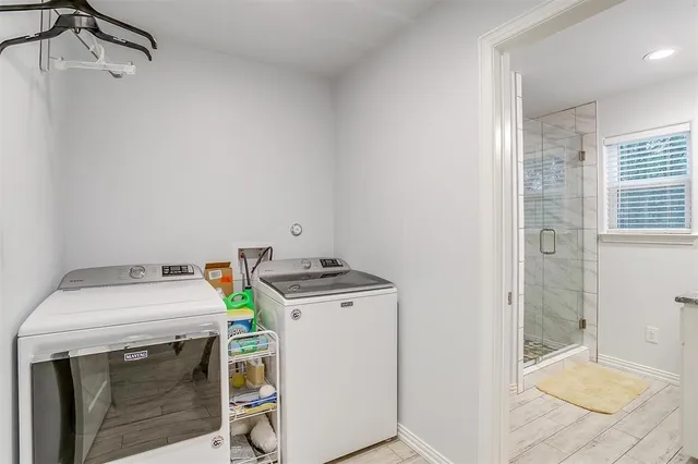 a utility room with dryer and washer
