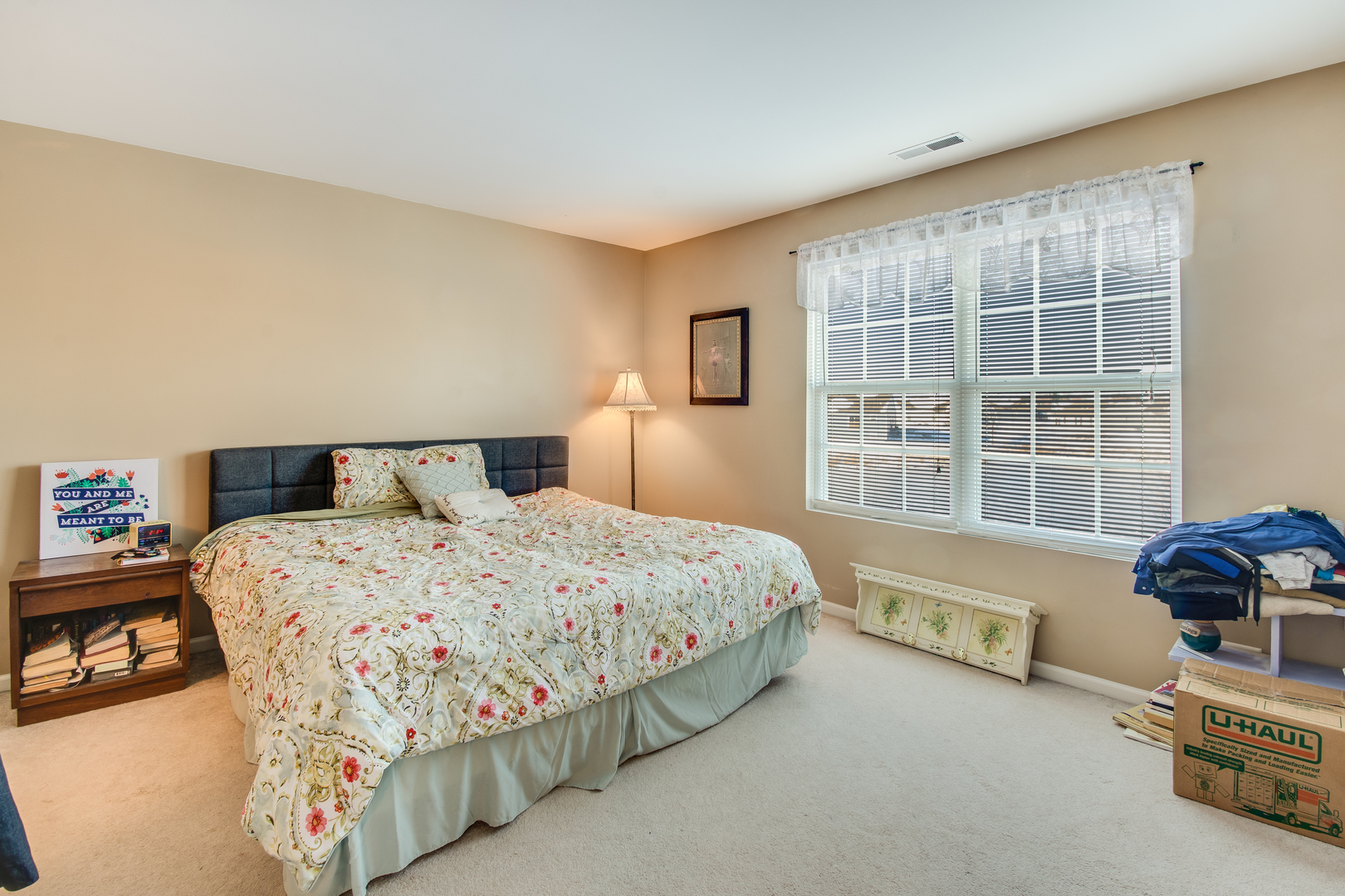 2765 Crooker Drive Yorkville, IL 60560 - Photo 18 of 21 a bedroom with a bed and a window