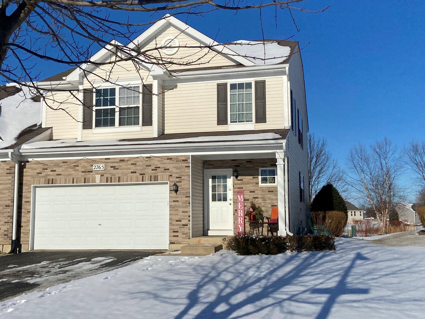 2765 Crooker Drive Yorkville, IL 60560 - Photo 2 of 21 a front view of a house with a yard