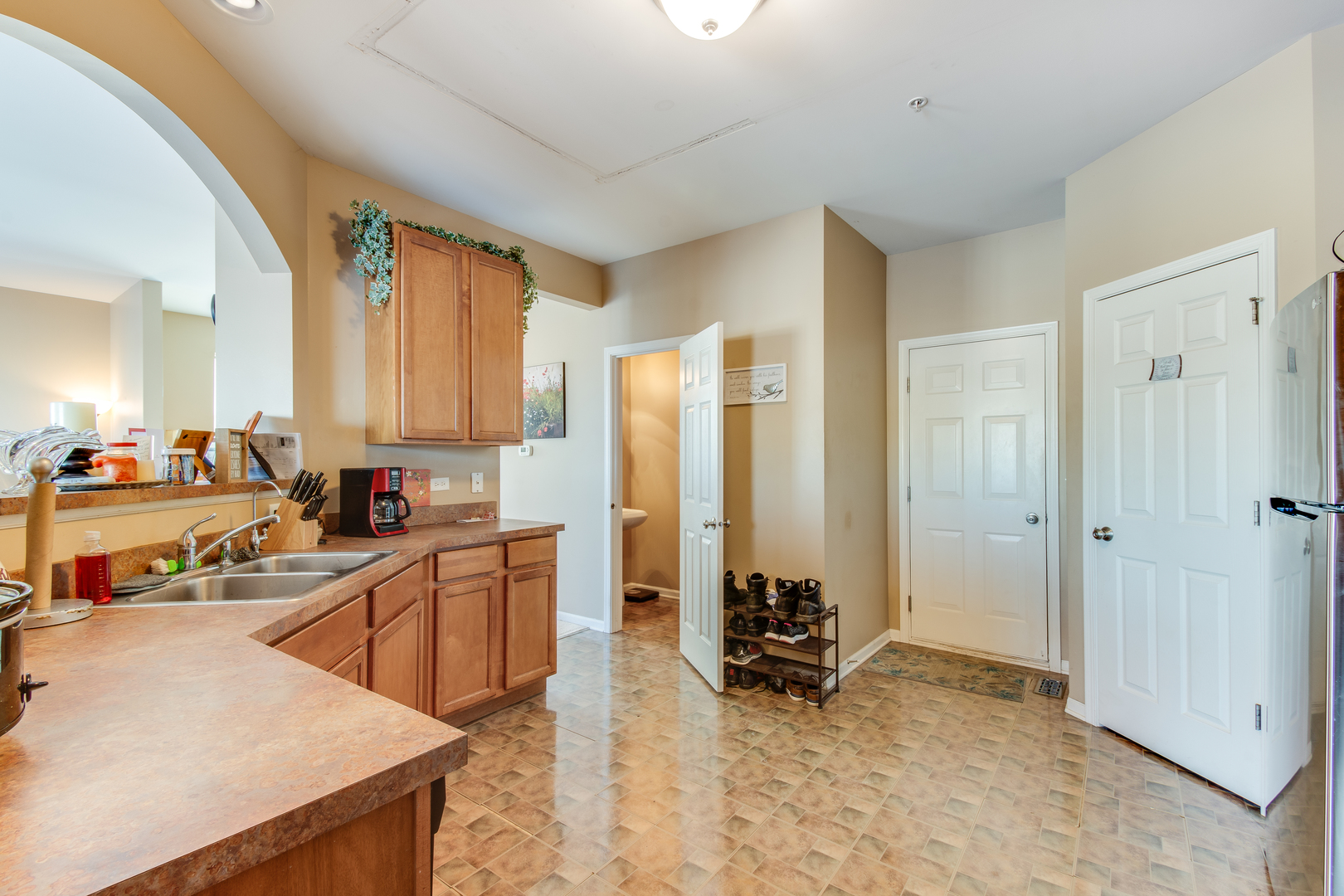 2765 Crooker Drive Yorkville, IL 60560 - Photo 6 of 21 a view of kitchen with sink refrigerator and cabinets