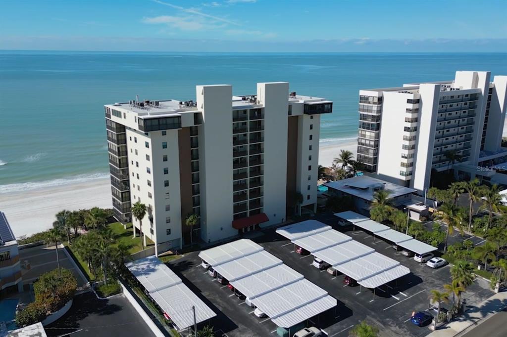 15400 Gulf Boulevard, Unit 505 Madeira Beach, FL 33708 - Photo 24 of 27 a backyard of a house with seating space