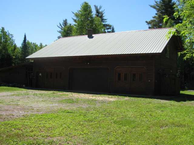 23 Trapper's Point Road Lakeville, ME 04487 - Photo 2 of 35 Exterior Front. Unique carriage...