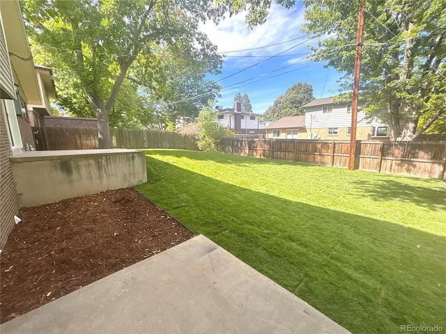a view of a backyard with a garden