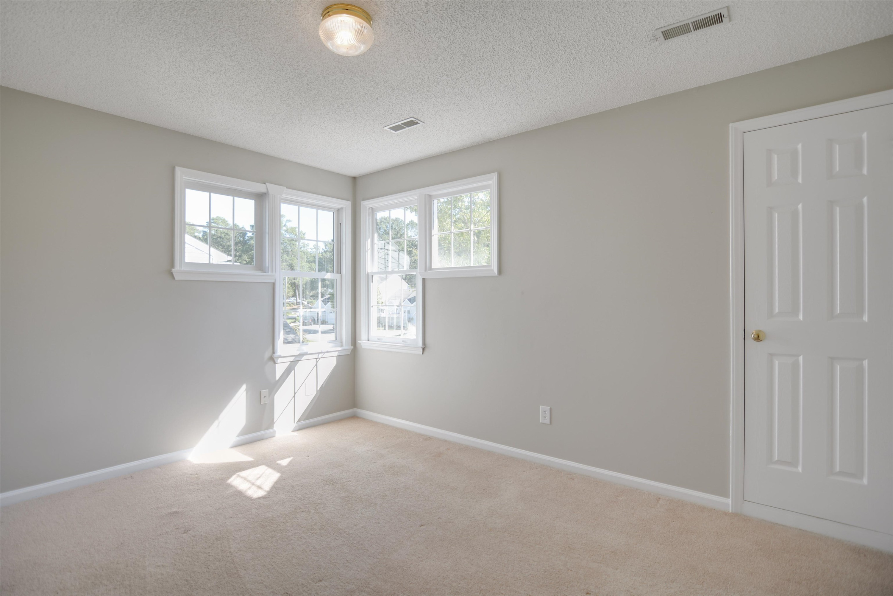 114 Breakers Place Cary, NC 27511 - Photo 15 of 19 an empty room with windows and closet