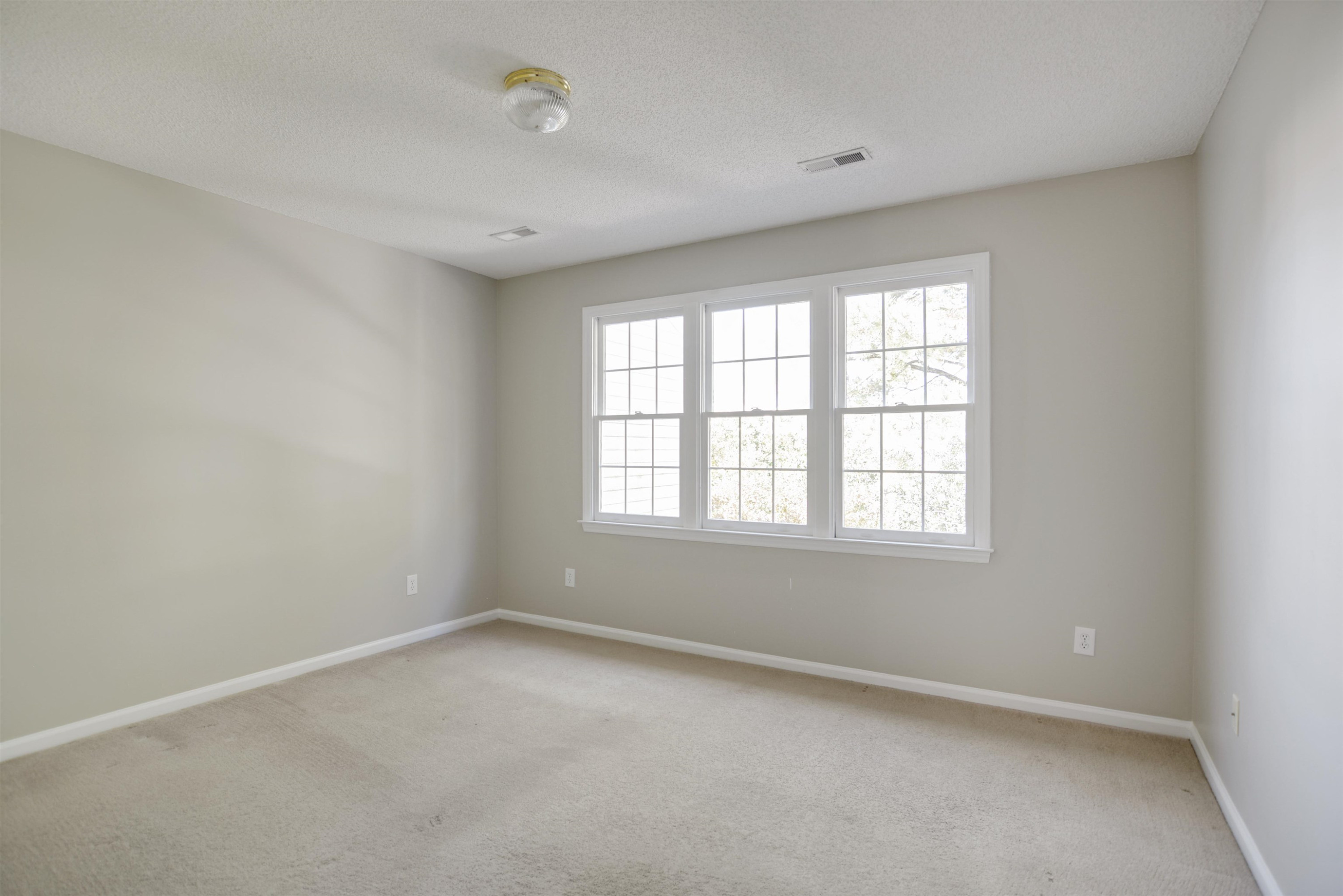 114 Breakers Place Cary, NC 27511 - Photo 16 of 19 an empty room with a window