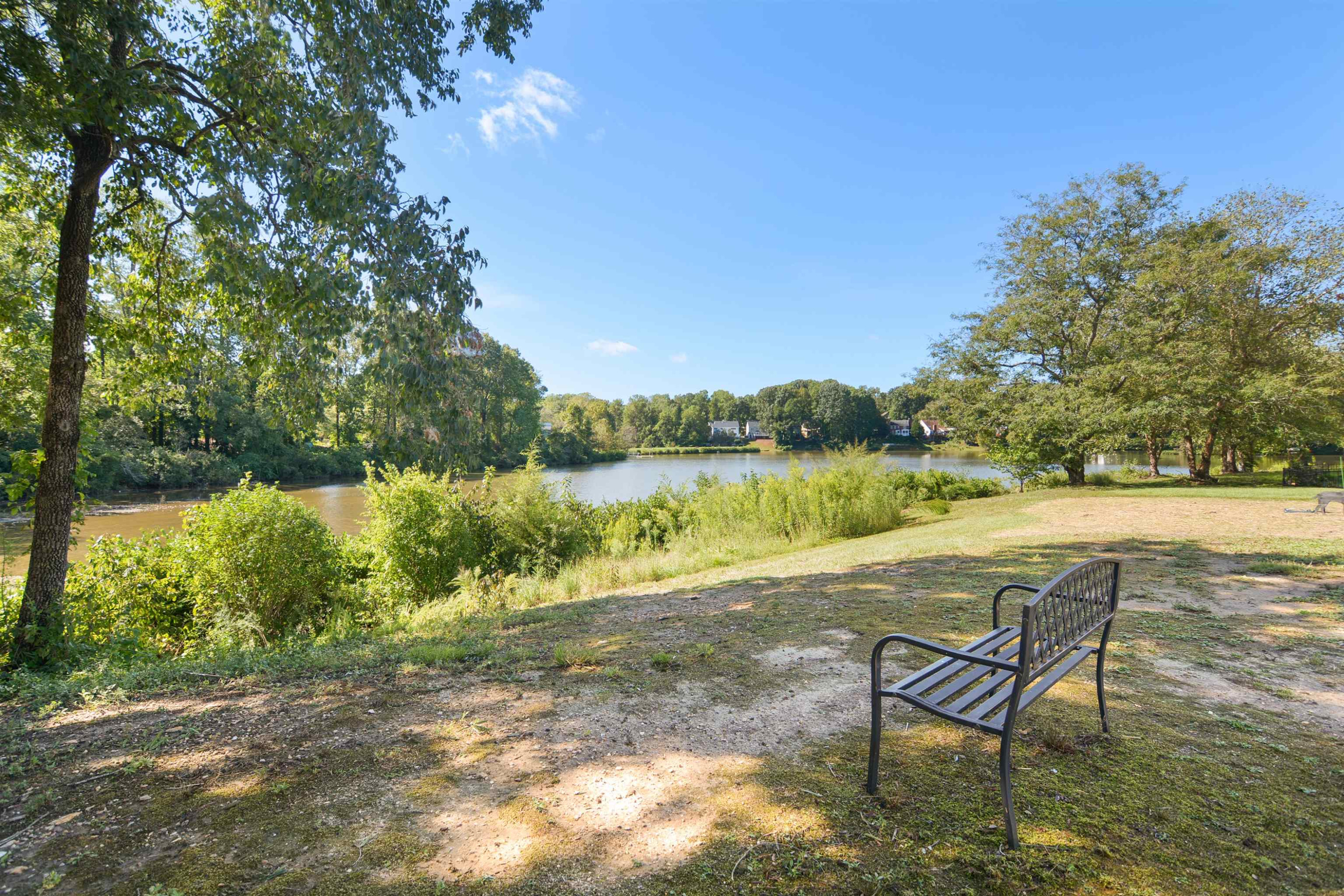 114 Breakers Place Cary, NC 27511 - Photo 19 of 19 a view of lake with table and chairs