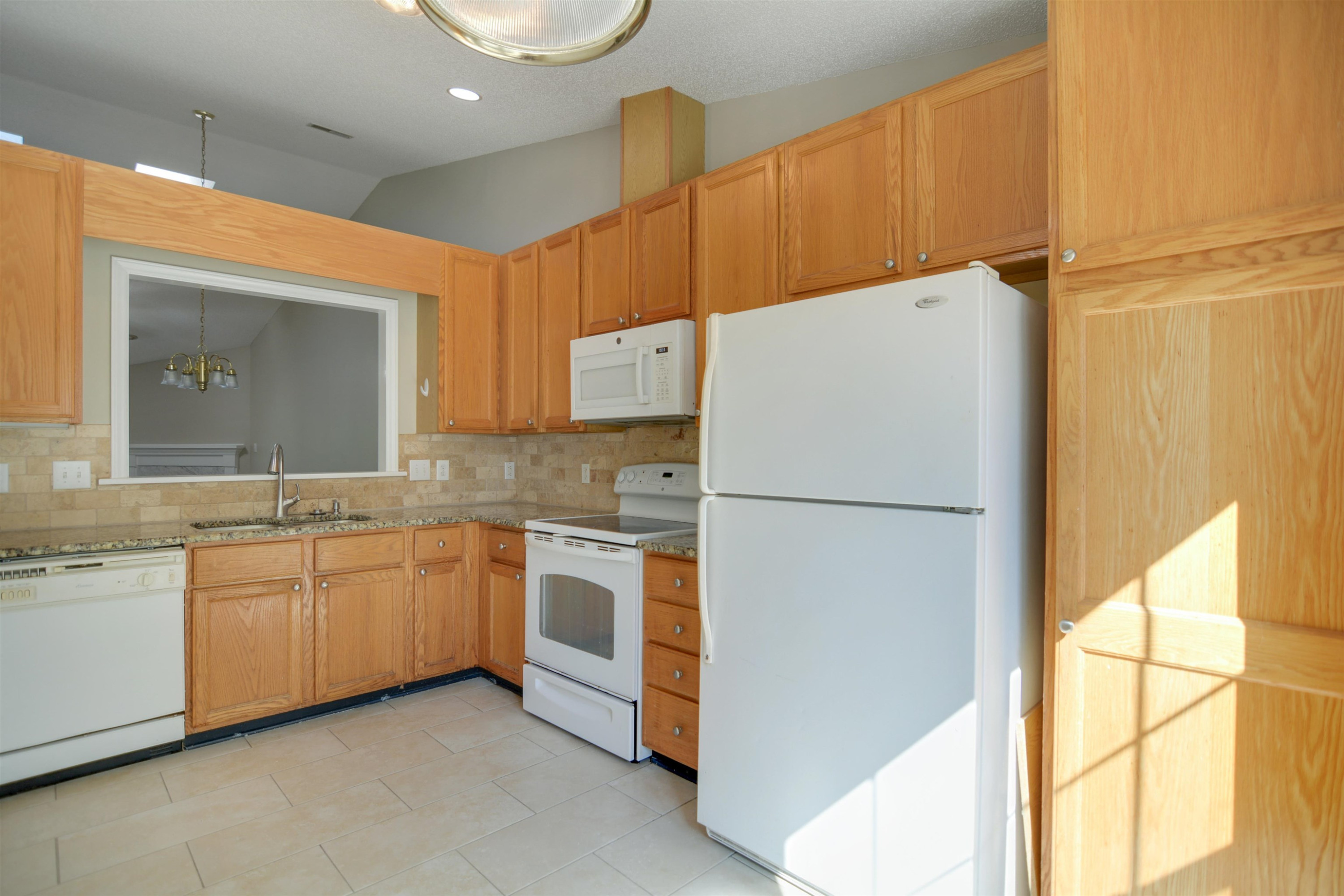 114 Breakers Place Cary, NC 27511 - Photo 9 of 19 a white refrigerator freezer sitting inside of a kitchen
