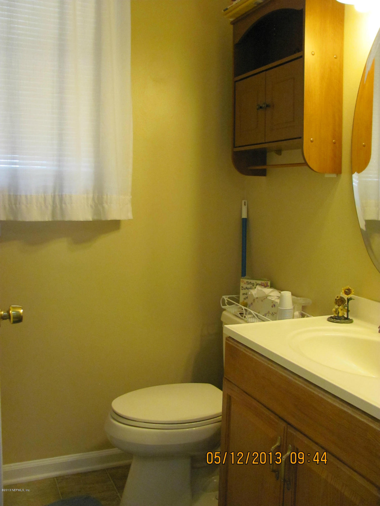 2121 Southampton Road Jacksonville, FL 32207 - Photo 15 of 21 a bathroom with a sink and a toilet
