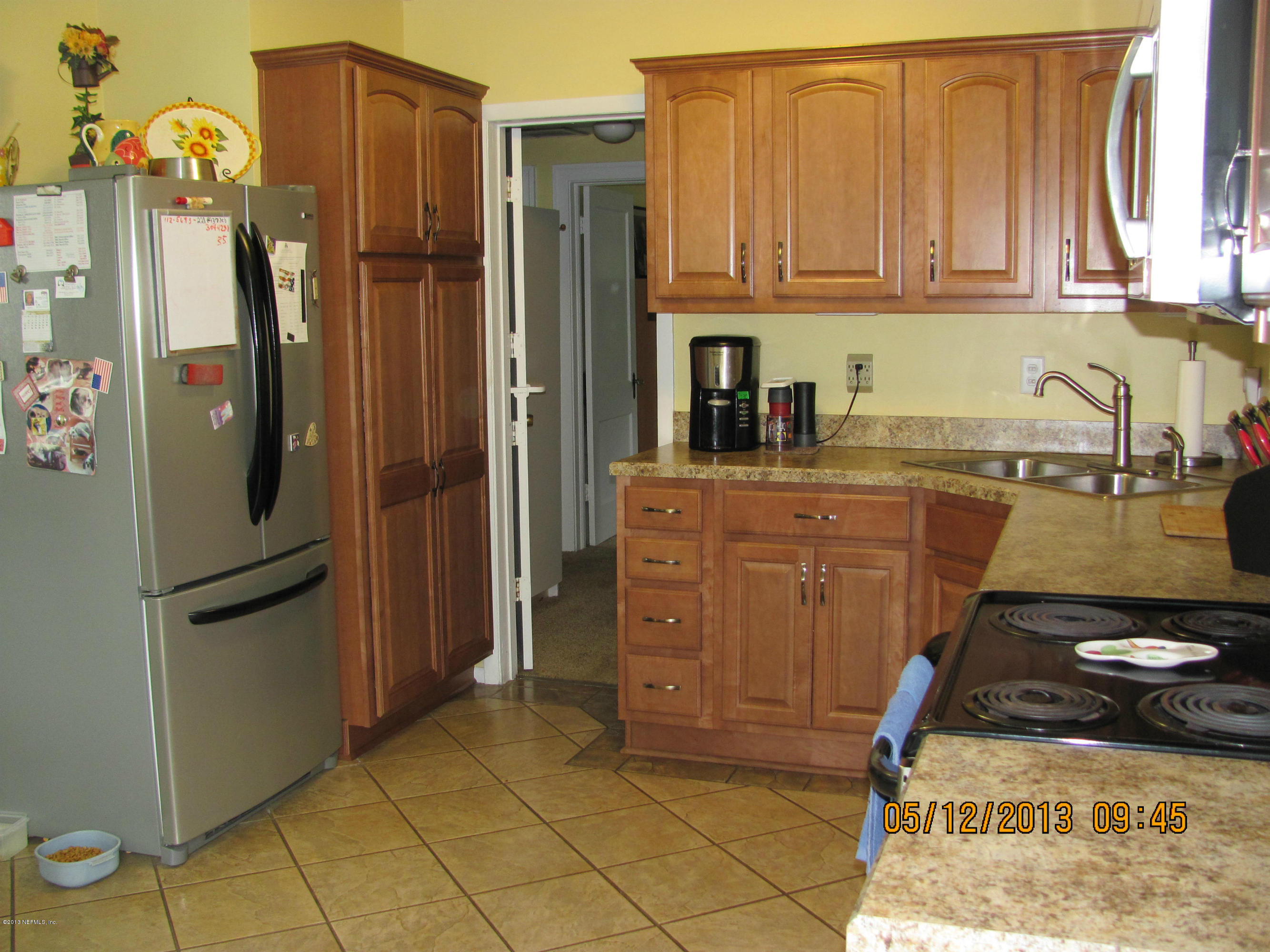 2121 Southampton Road Jacksonville, FL 32207 - Photo 16 of 21 a kitchen with stainless steel appliances granite countertop a refrigerator and a stove