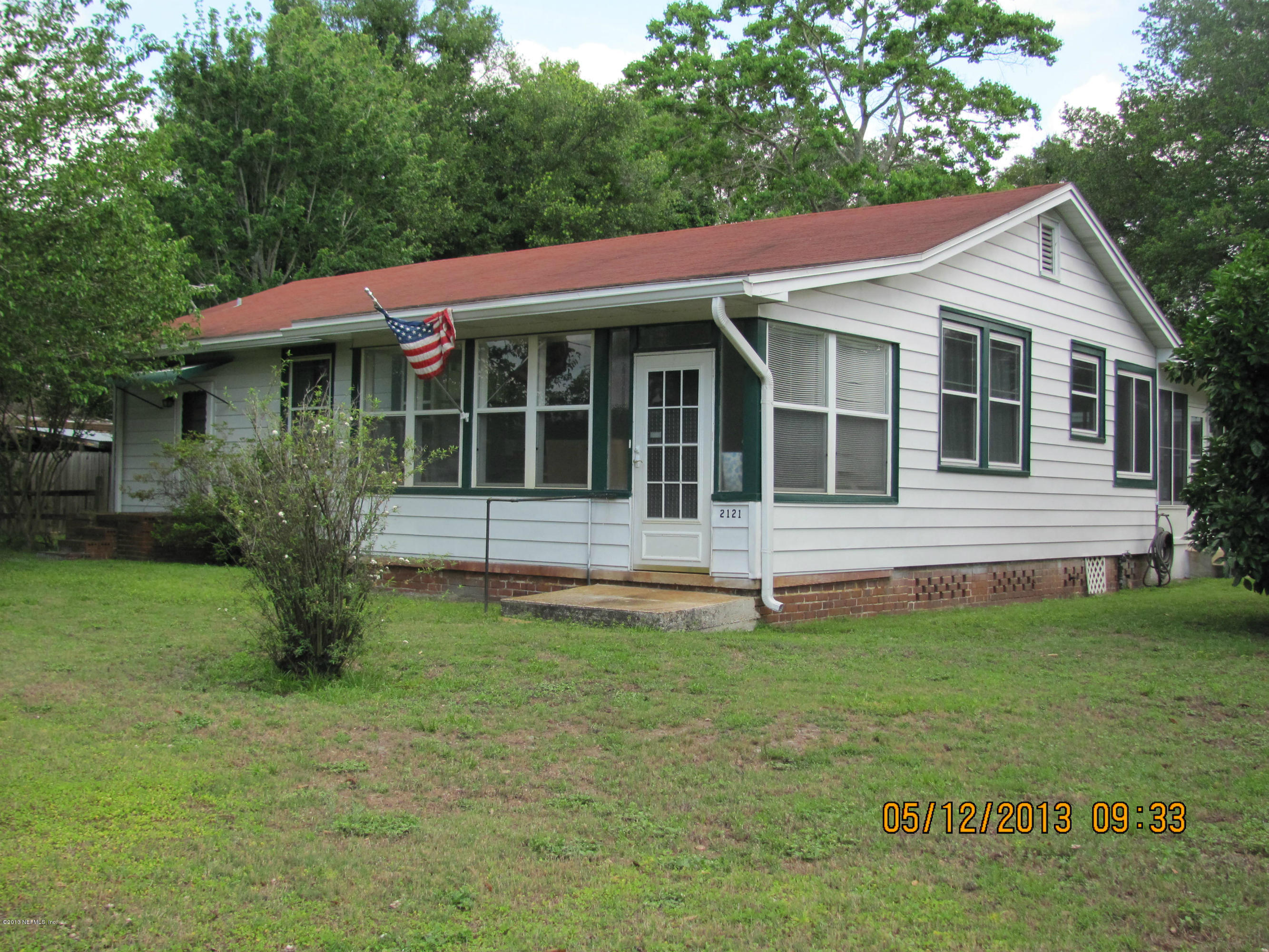 2121 Southampton Road Jacksonville, FL 32207 - Photo 2 of 21 a front view of a house with a yard