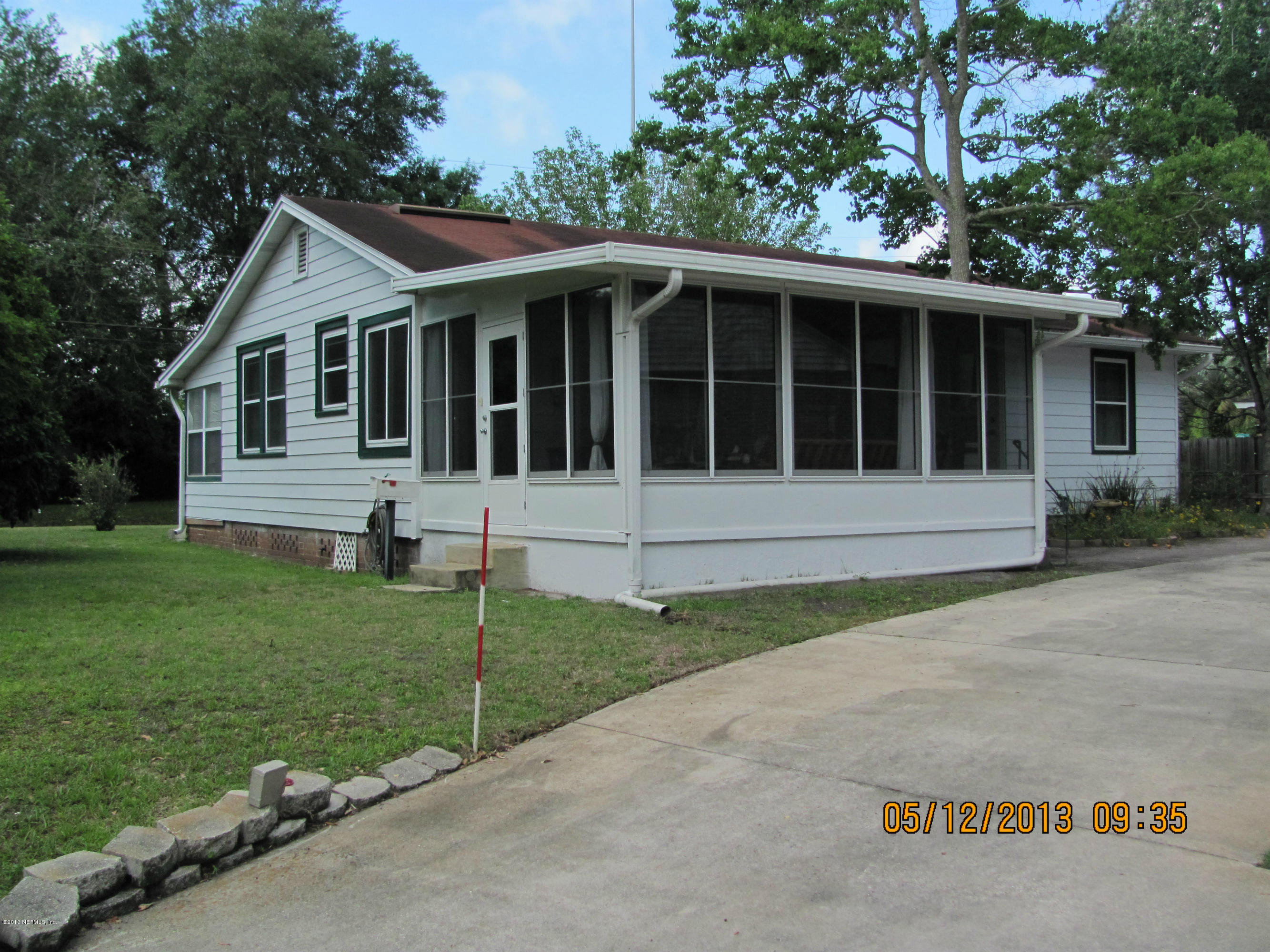 2121 Southampton Road Jacksonville, FL 32207 - Photo 3 of 21 a front view of a house with a garden
