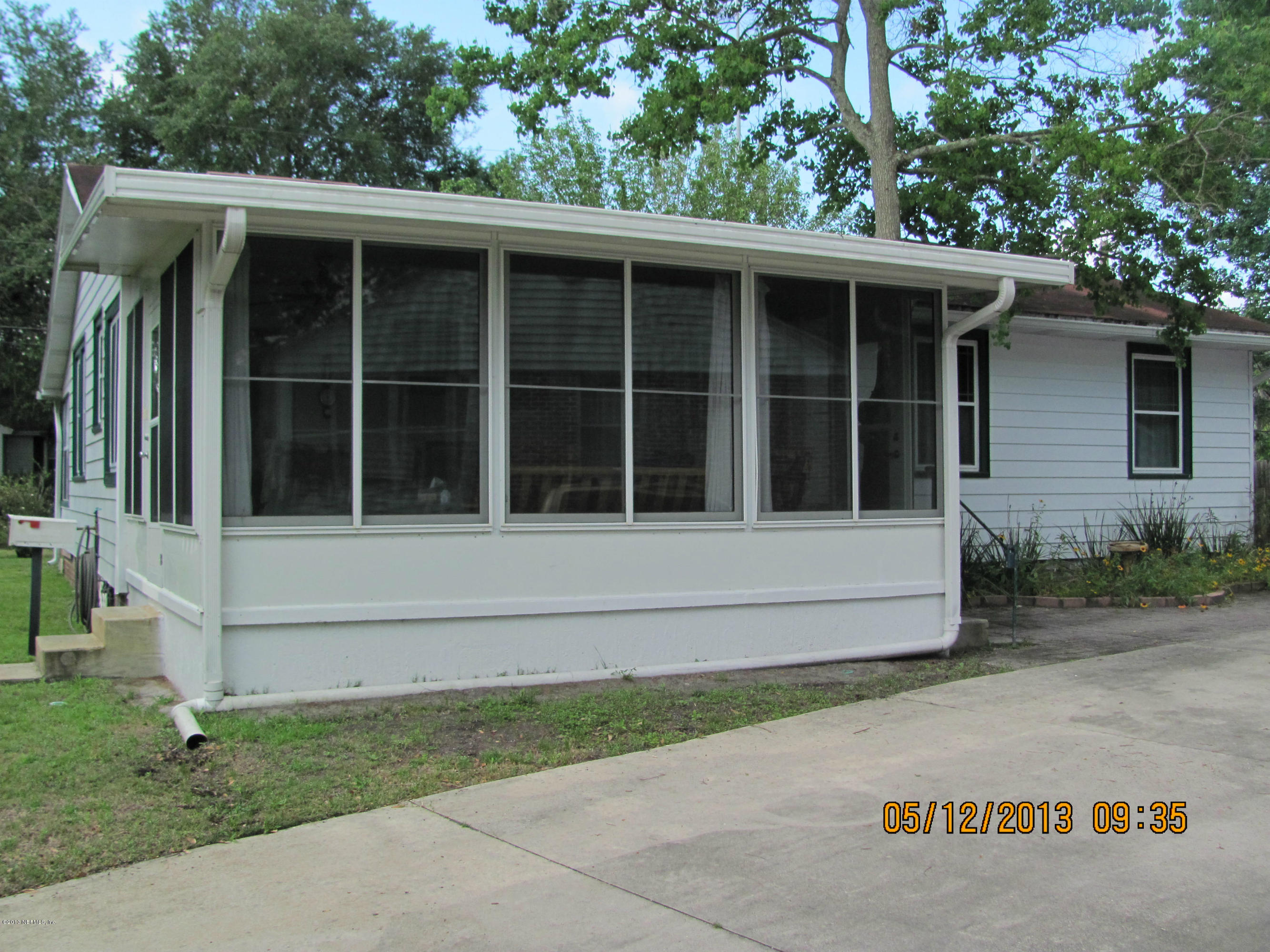 2121 Southampton Road Jacksonville, FL 32207 - Photo 4 of 21 a view of front of house with a large window