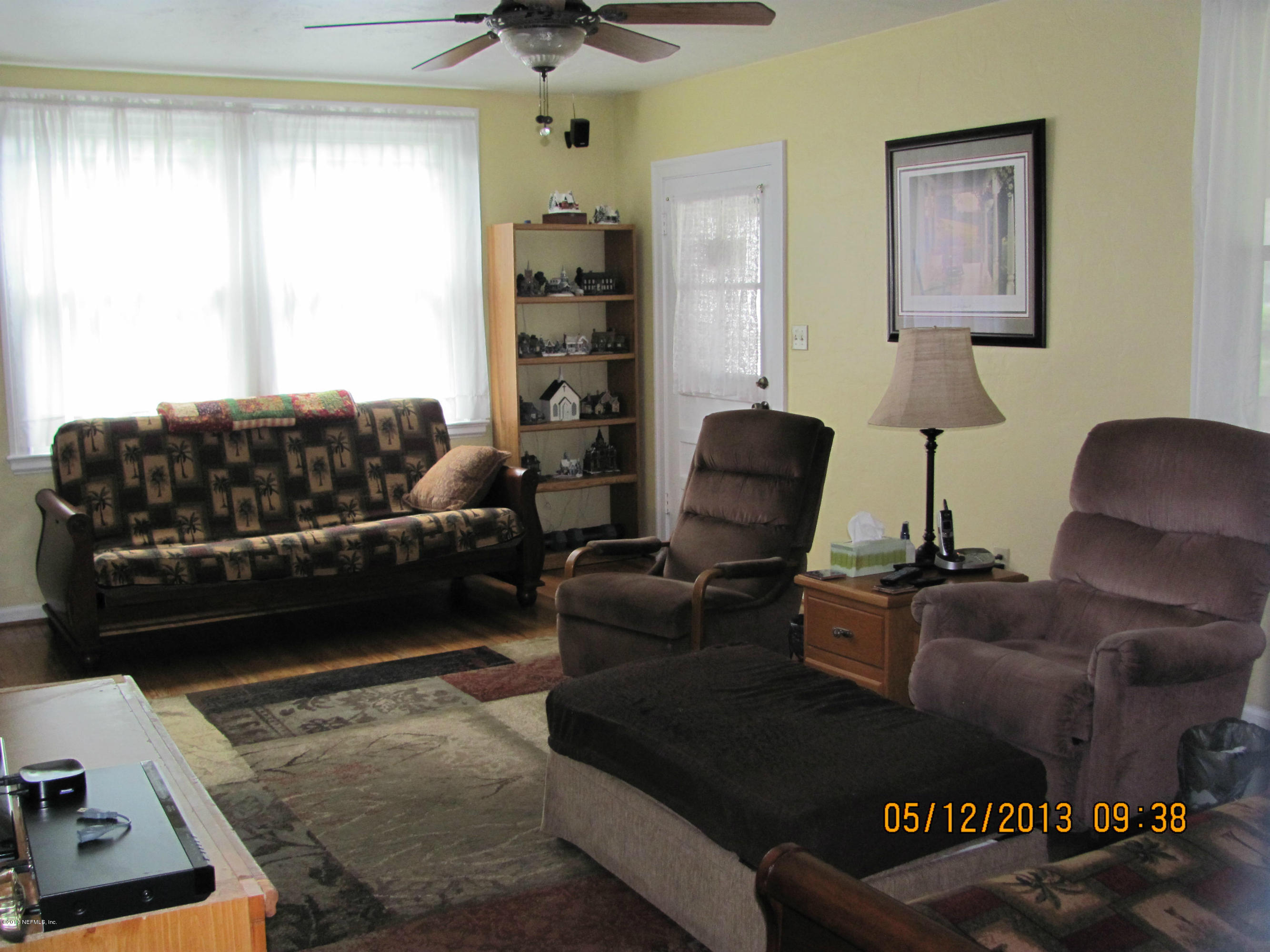 2121 Southampton Road Jacksonville, FL 32207 - Photo 9 of 21 a living room with furniture and a window