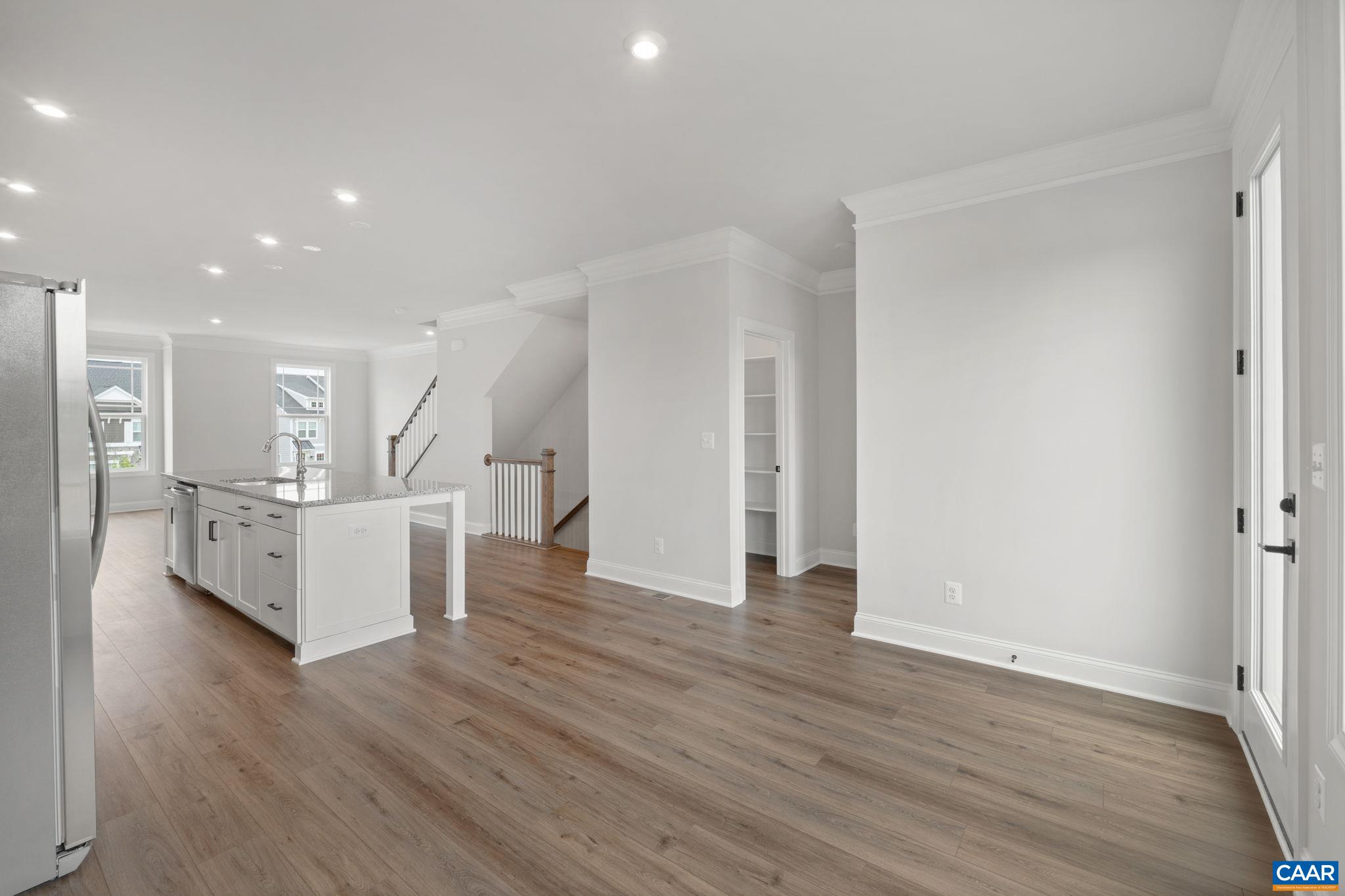 135 Park Ridge Drive Crozet, VA 22932 - Photo 18 of 46 a view of kitchen and hall with wooden floor