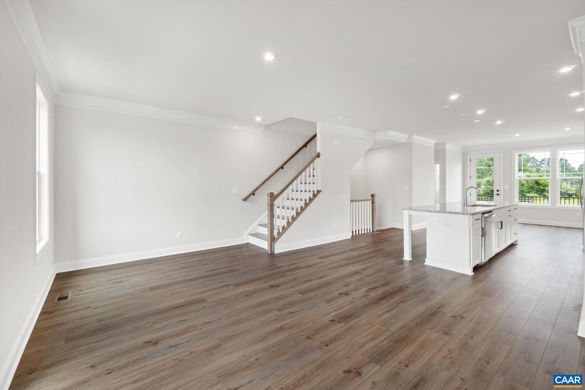 135 Park Ridge Drive Crozet, VA 22932 - Photo 24 of 46 a view of a kitchen with wooden floor and stairs