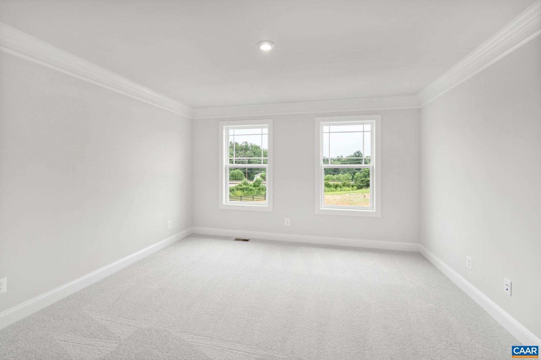 135 Park Ridge Drive Crozet, VA 22932 - Photo 26 of 46 an empty room with windows