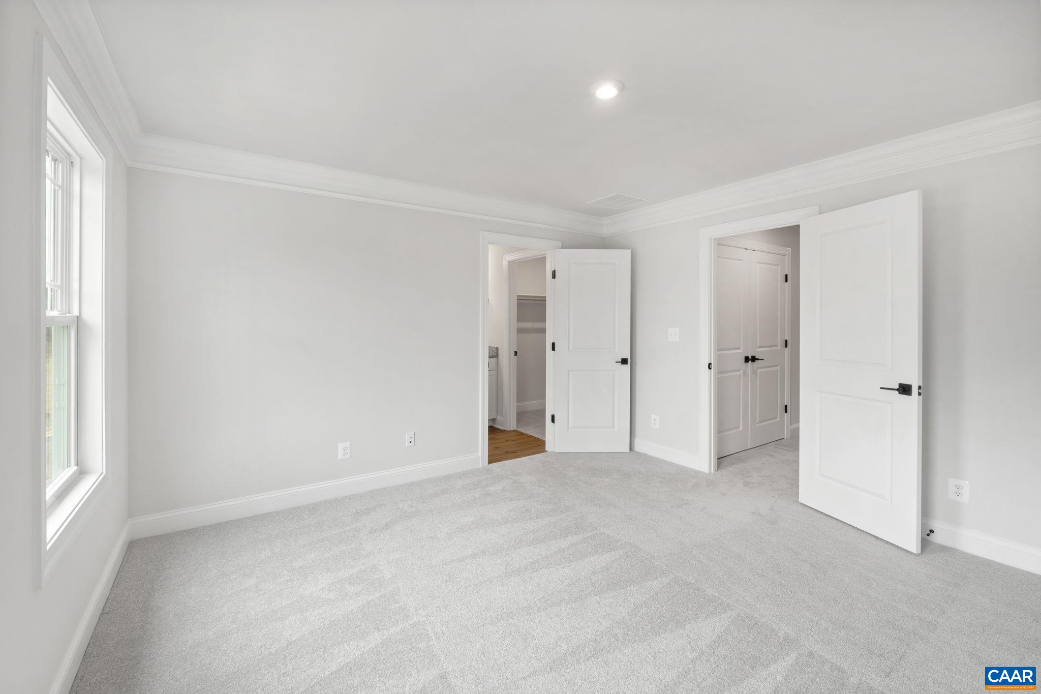 135 Park Ridge Drive Crozet, VA 22932 - Photo 27 of 46 a view of an empty room with a window