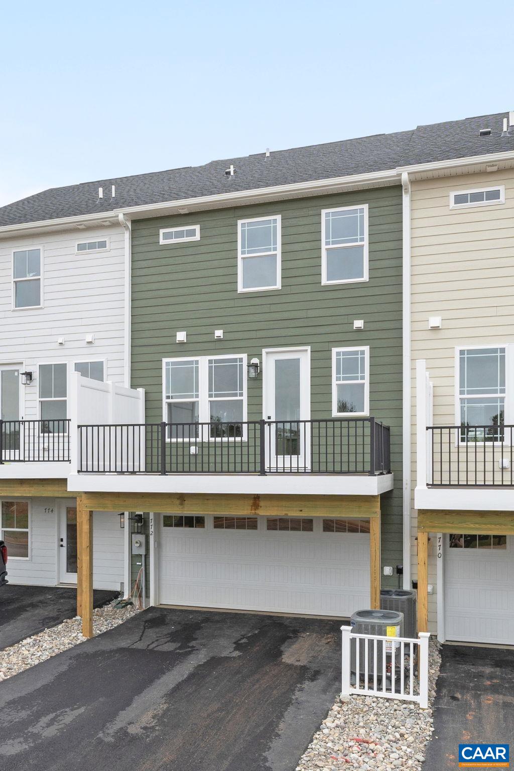 135 Park Ridge Drive Crozet, VA 22932 - Photo 38 of 46 a view of a brick building with many windows
