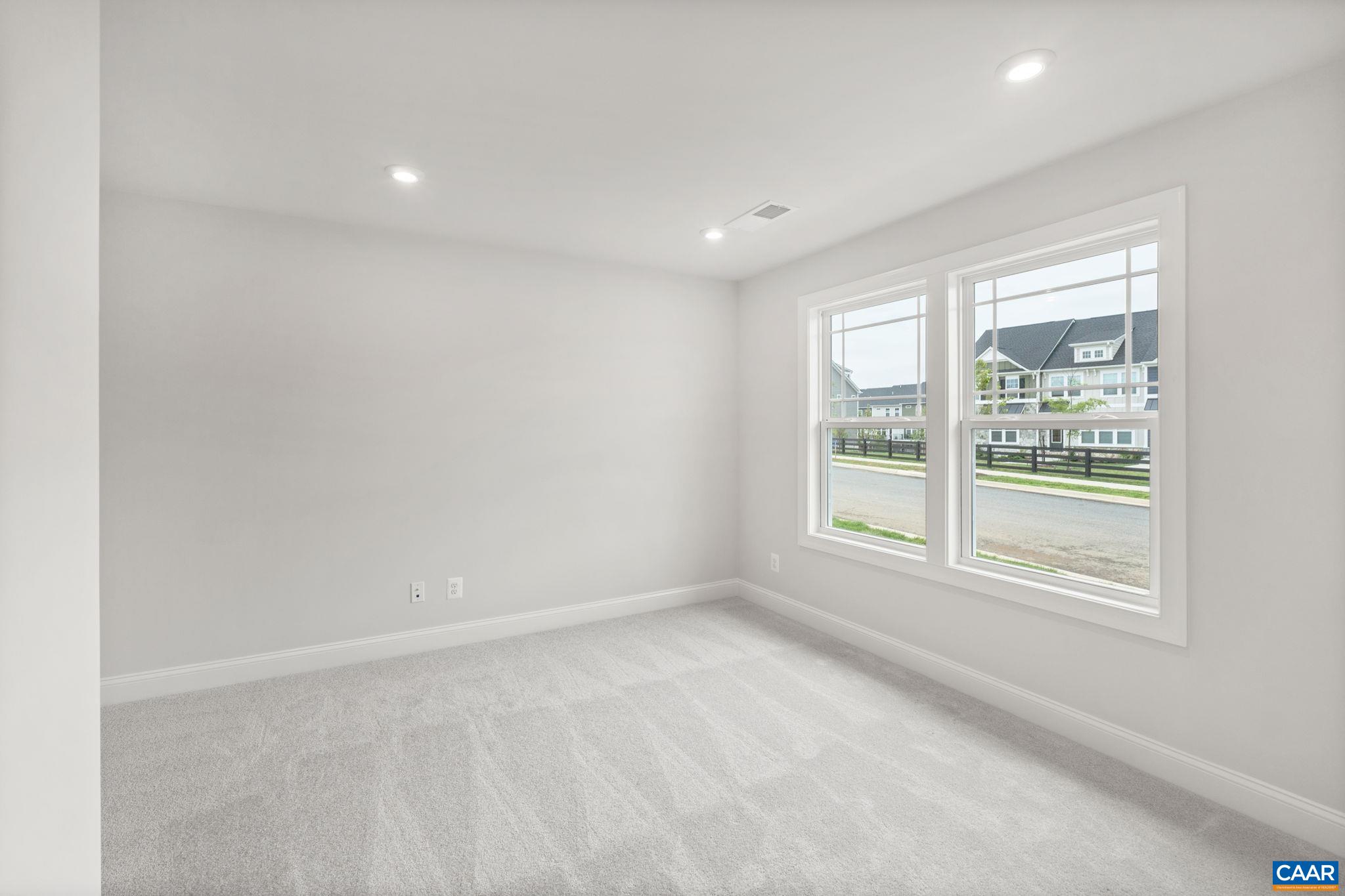 135 Park Ridge Drive Crozet, VA 22932 - Photo 7 of 46 an empty room with windows
