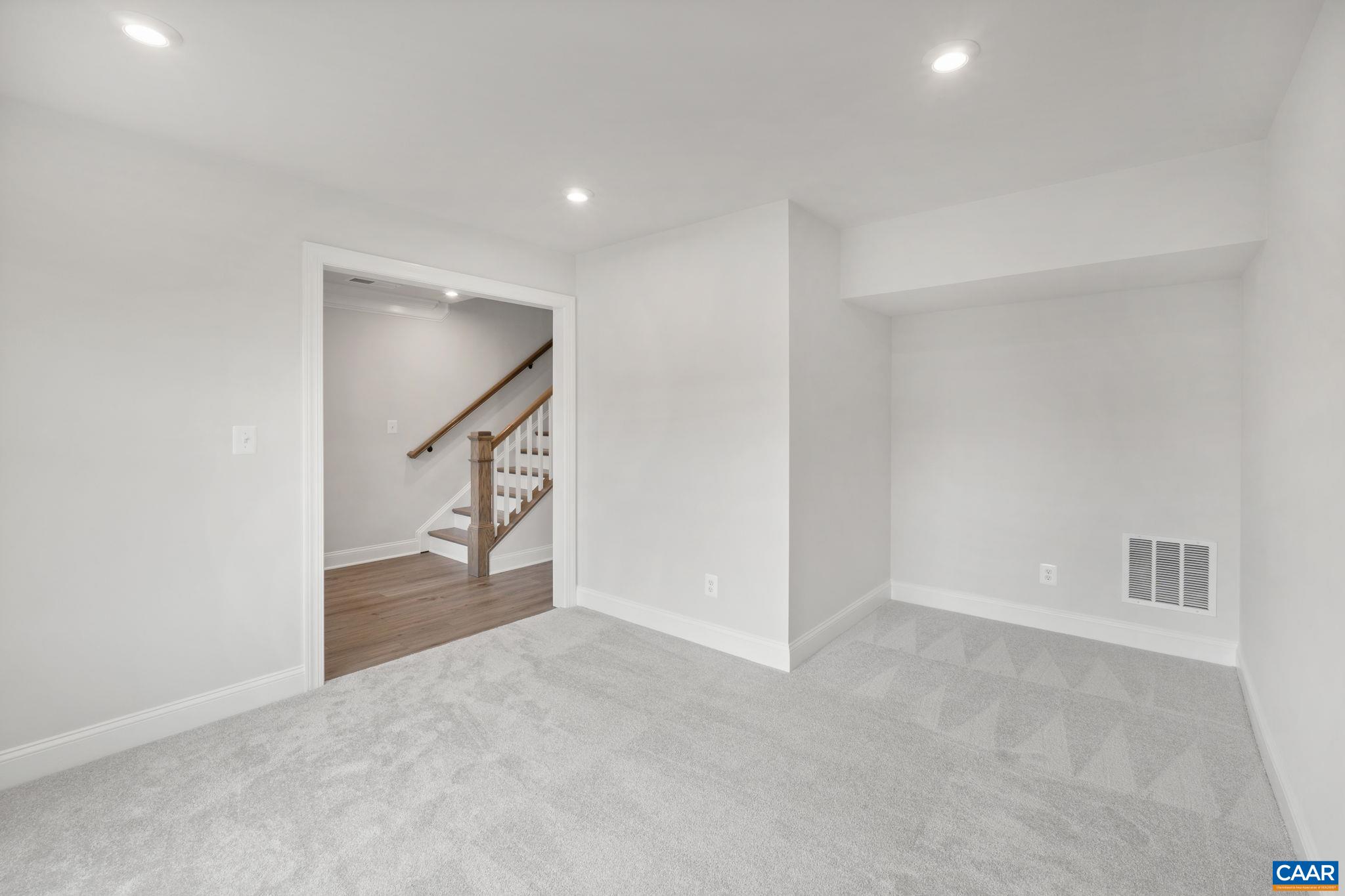 135 Park Ridge Drive Crozet, VA 22932 - Photo 8 of 46 a view of an empty room and stairs