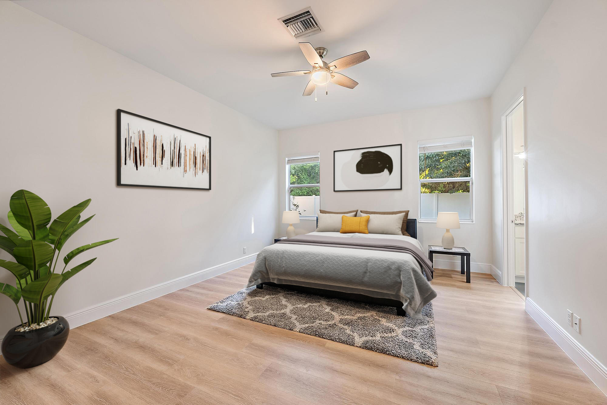 6762 2nd Street Jupiter, FL 33458 - Photo 14 of 27 a bedroom with a bed and a window