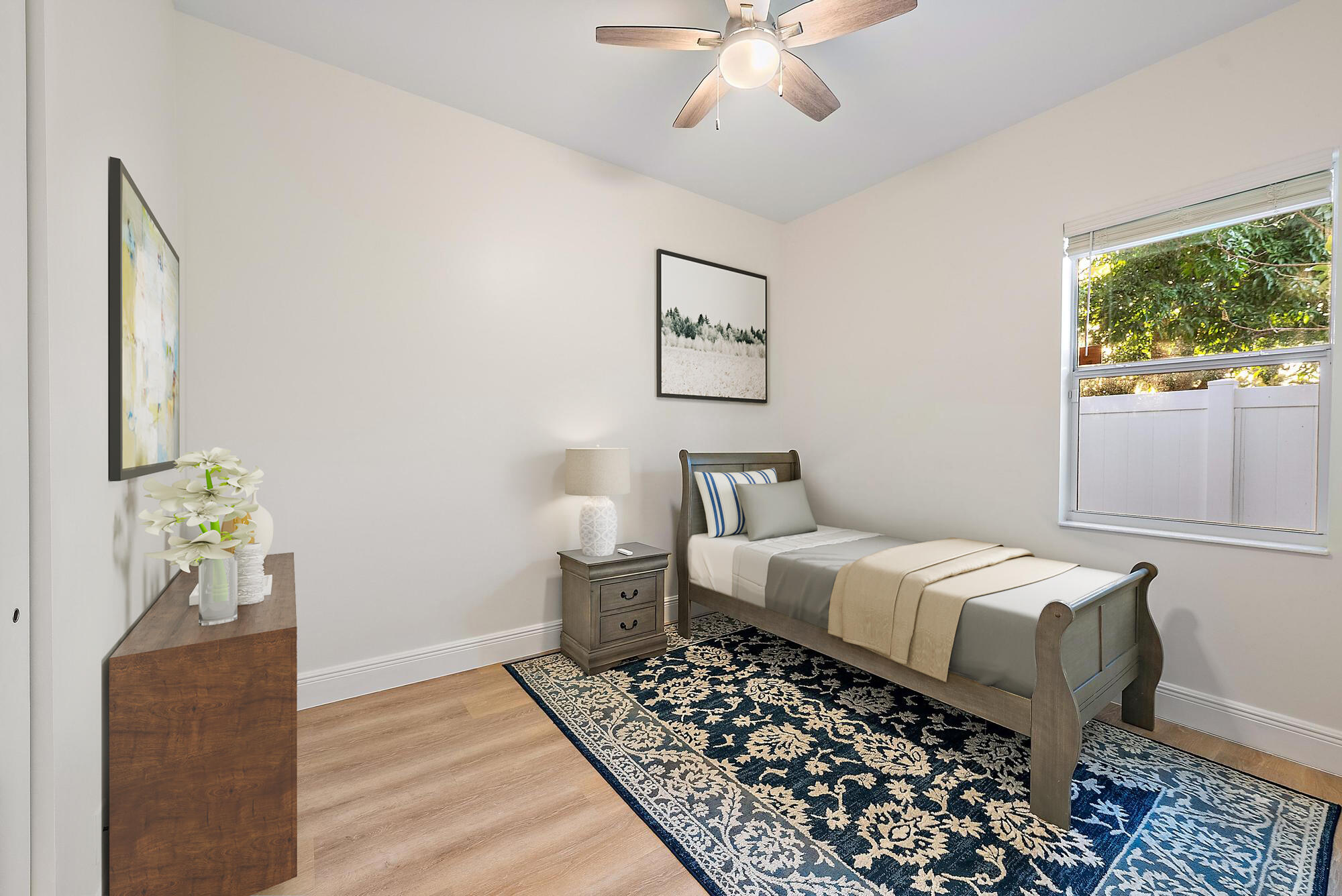 6762 2nd Street Jupiter, FL 33458 - Photo 18 of 27 a bedroom with a bed and wooden floor