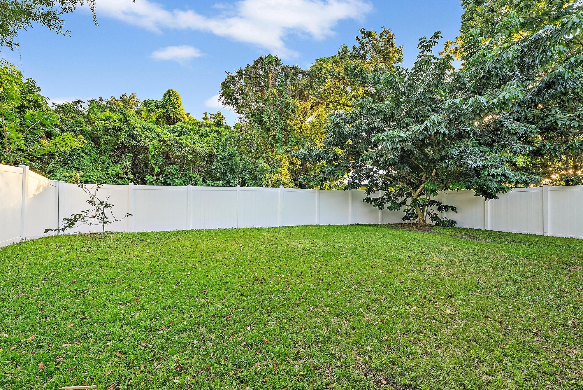 6762 2nd Street Jupiter, FL 33458 - Photo 22 of 27 a view of a backyard