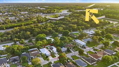 an aerial view of residential building with parking space