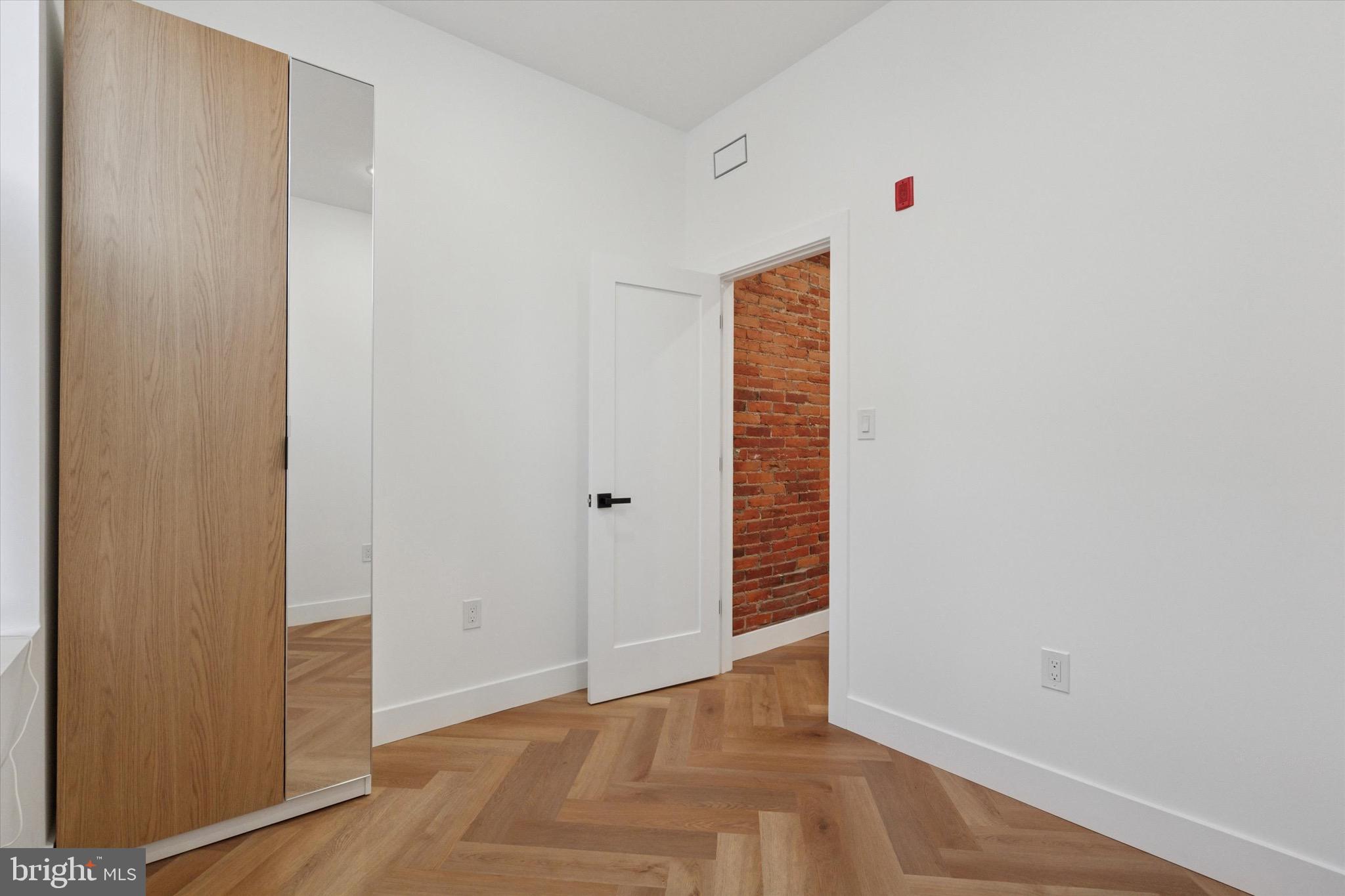 1438 Tasker Street, Unit 1 Philadelphia, PA 19145 - Photo 9 of 16 a view of an empty room