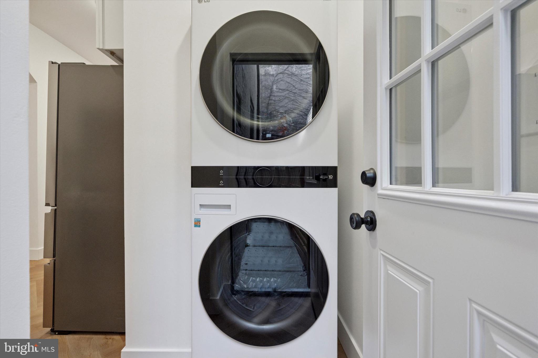 1438 Tasker Street, Unit 1 Philadelphia, PA 19145 - Photo 10 of 16 a close up view of a washer and dryer