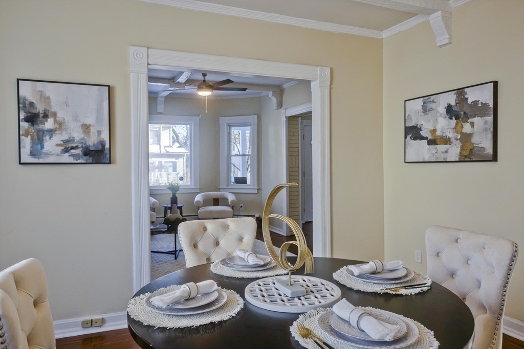 30 Parkwood Street Springfield, MA 01108 - Photo 11 of 41 a view of a dining room with furniture on walls and wooden floor