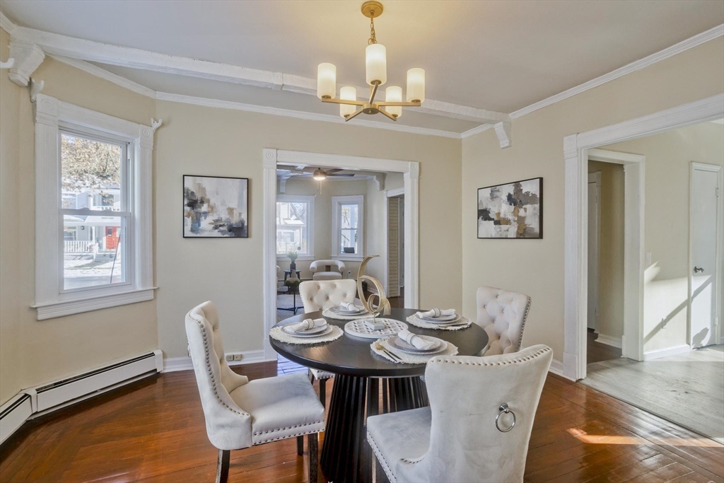 30 Parkwood Street Springfield, MA 01108 - Photo 12 of 41 a view of a dining room with furniture window and wooden floor