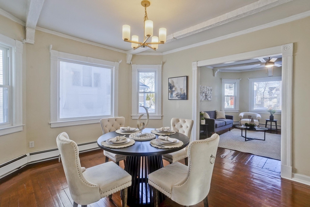 30 Parkwood Street Springfield, MA 01108 - Photo 2 of 41 a view of a dining room with furniture wooden floor and chandelier