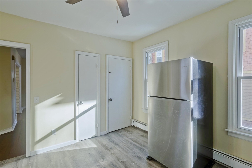 30 Parkwood Street Springfield, MA 01108 - Photo 21 of 41 a view of kitchen with furniture refrigerator and window