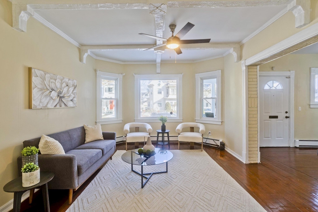30 Parkwood Street Springfield, MA 01108 - Photo 9 of 41 a living room with furniture and wooden floor