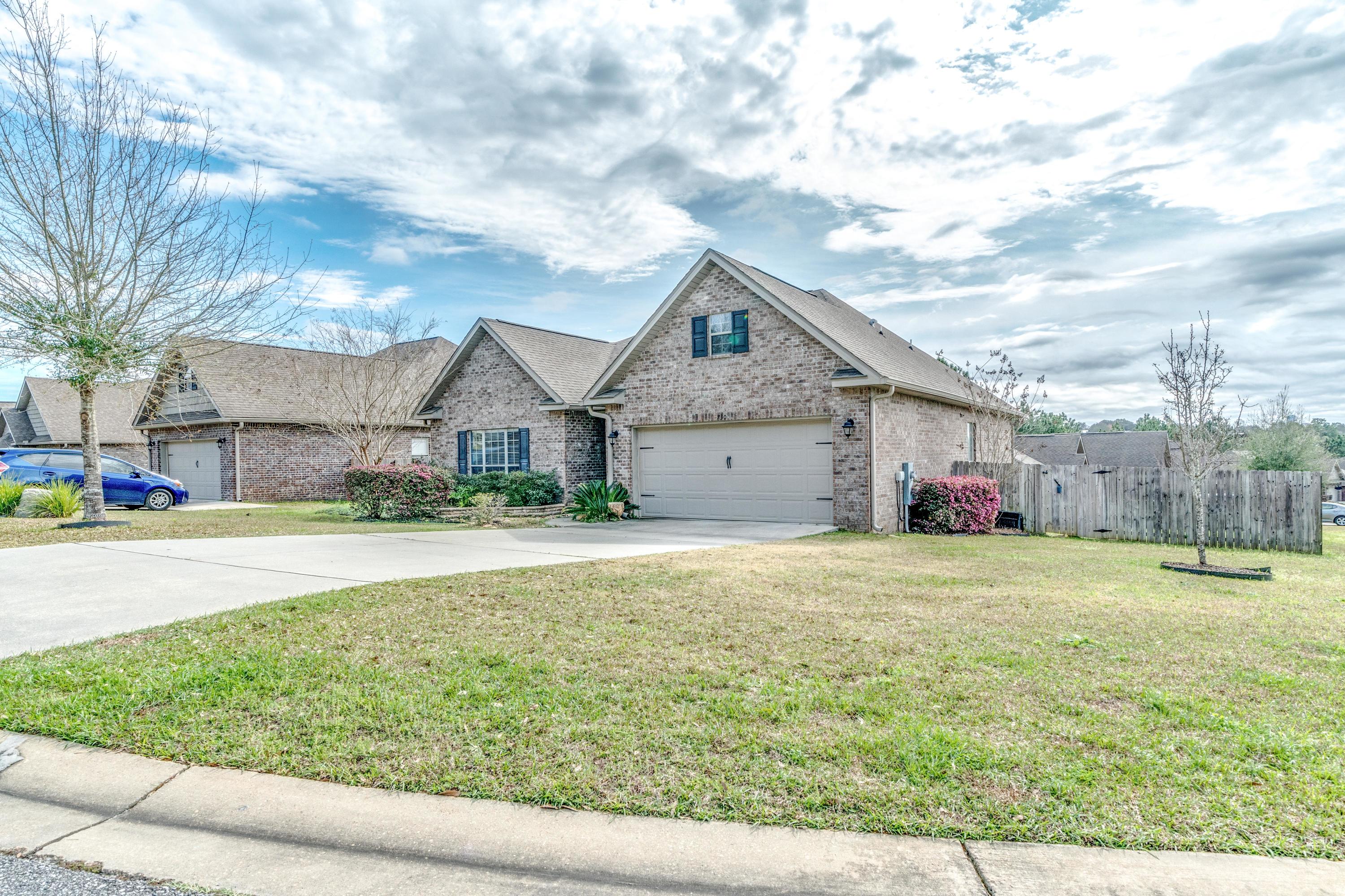 730 Lime Lane Crestview, FL 32536 - Photo 2 of 25 a house view with a outdoor space