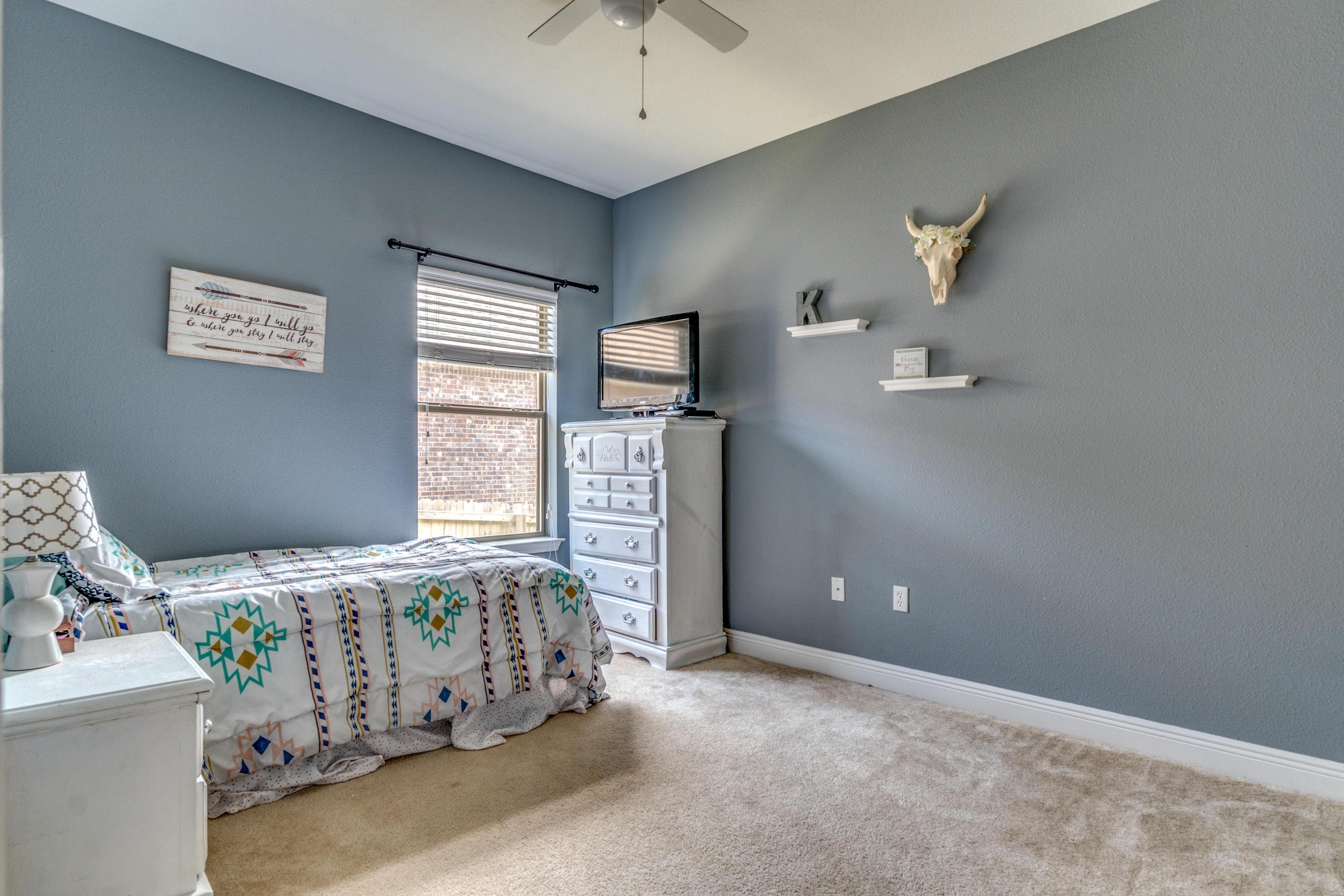 730 Lime Lane Crestview, FL 32536 - Photo 11 of 25 a bedroom with a bed and window