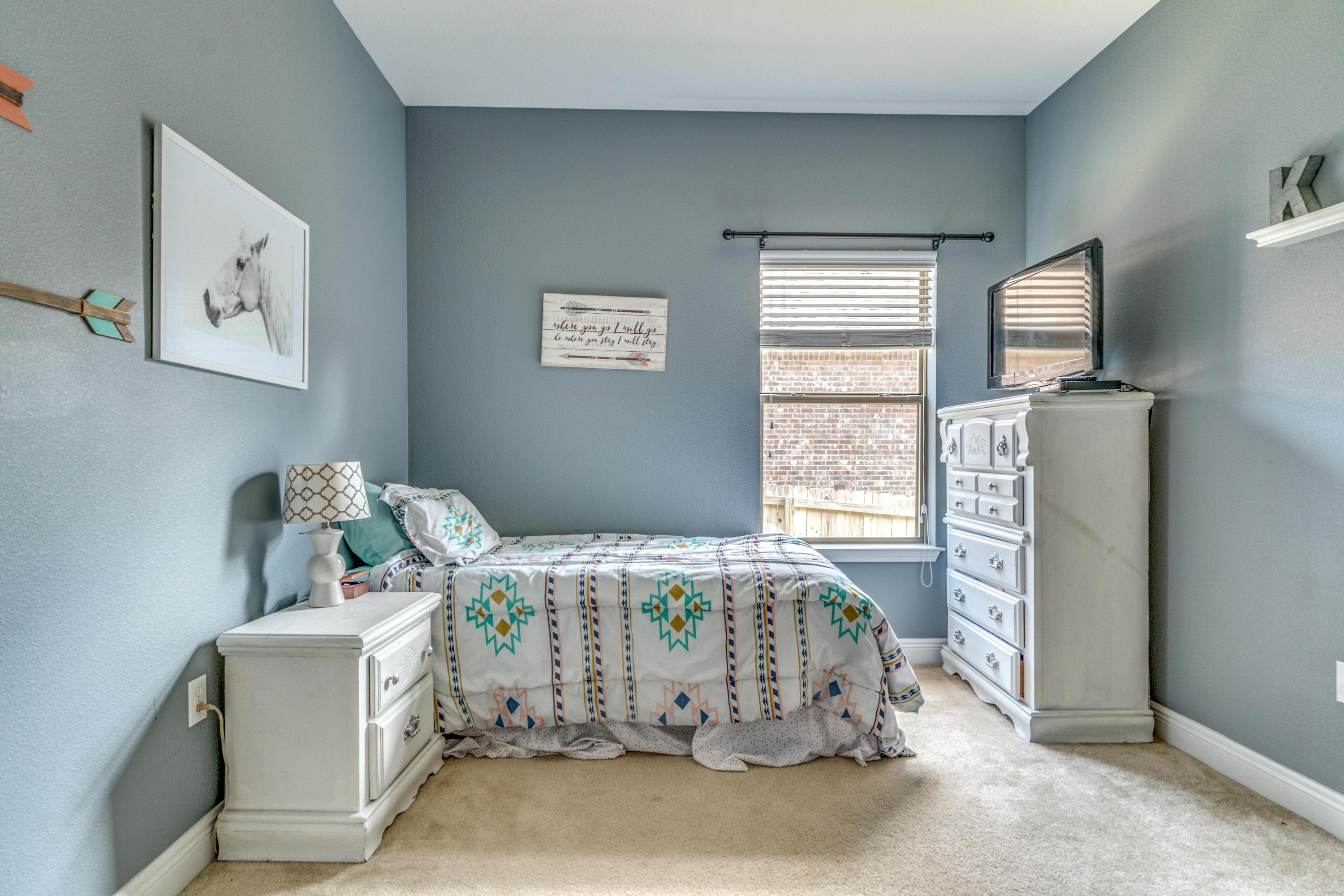 730 Lime Lane Crestview, FL 32536 - Photo 12 of 25 a bedroom with a bed and a window in it