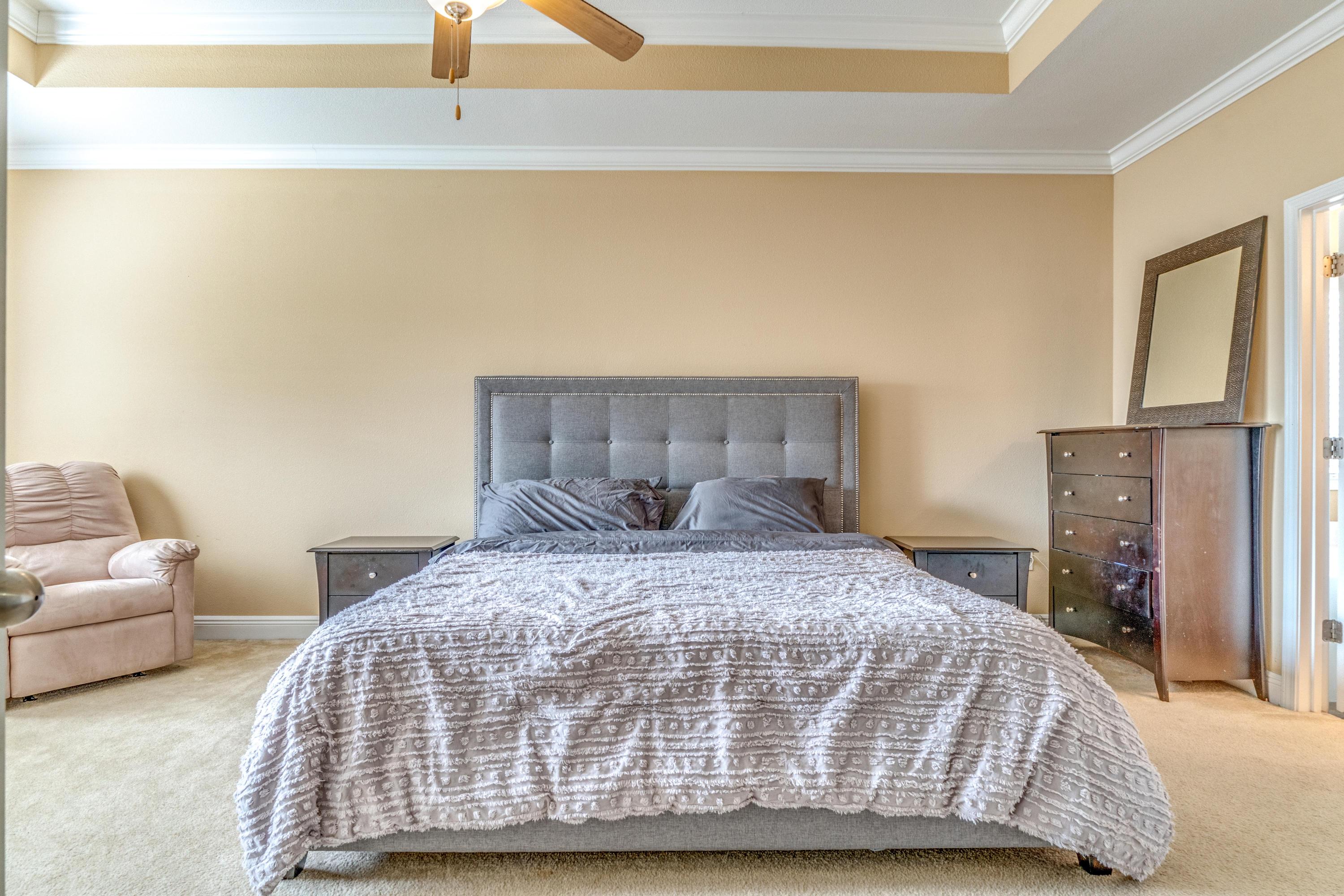 730 Lime Lane Crestview, FL 32536 - Photo 13 of 25 a bedroom with a bed and a couch