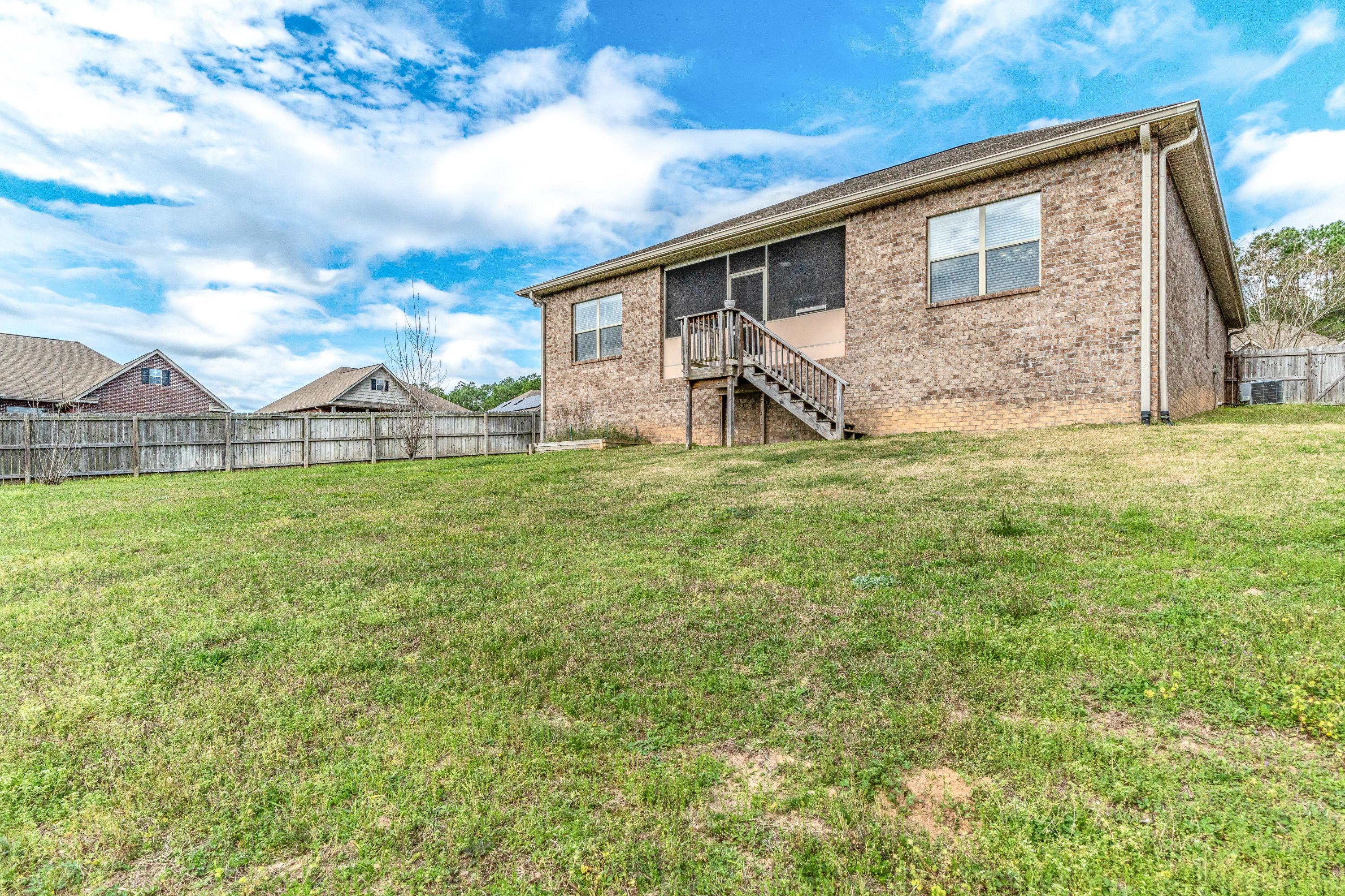 730 Lime Lane Crestview, FL 32536 - Photo 24 of 25 a view of a house with a yard