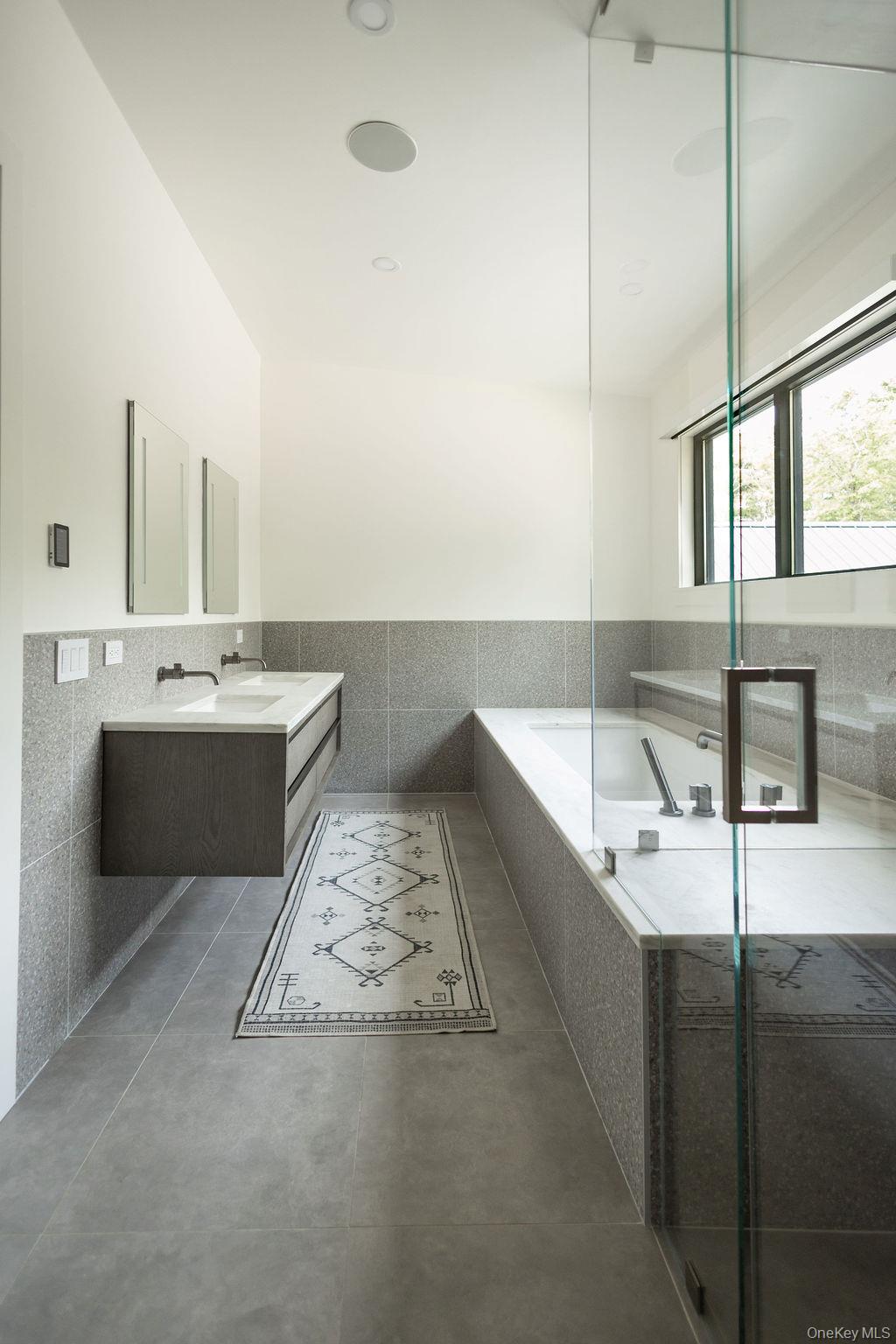 72 Van Tine Road Kerhonkson, NY 12446 - Photo 18 of 39 a bathroom with a tub sink and mirror