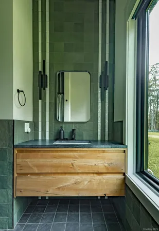 a bathroom with a sink and a toilet